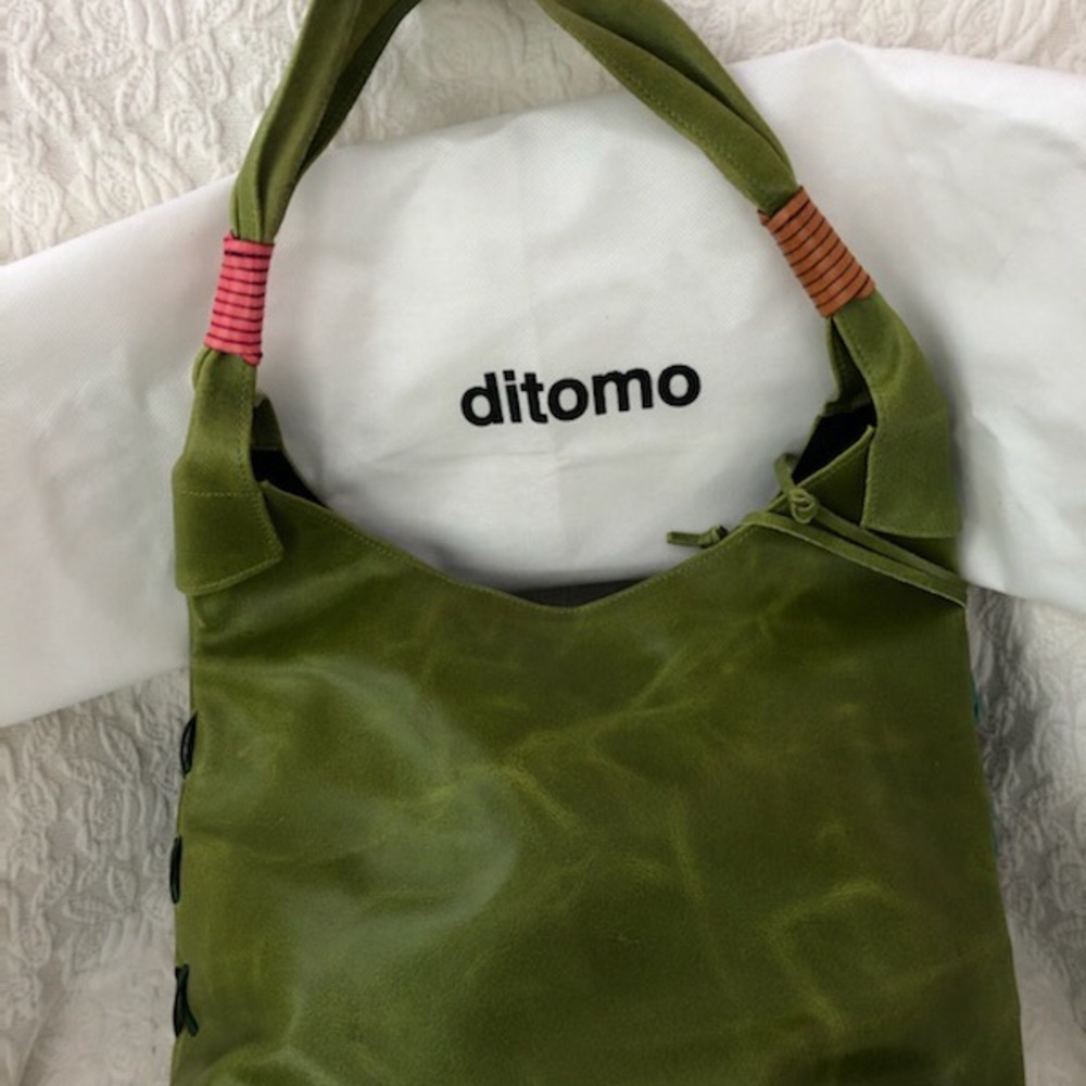 Ditomo green leather bag.  Excellent condition.  Made on Spain.  $100.00